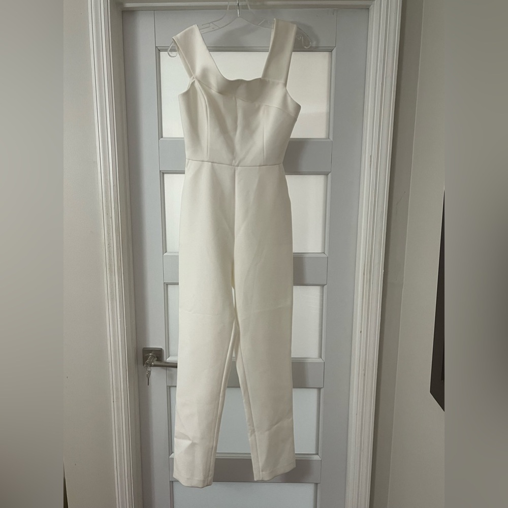 Elegant, Classy, Beautiful Cream BCBG jumpsuit. Size 6